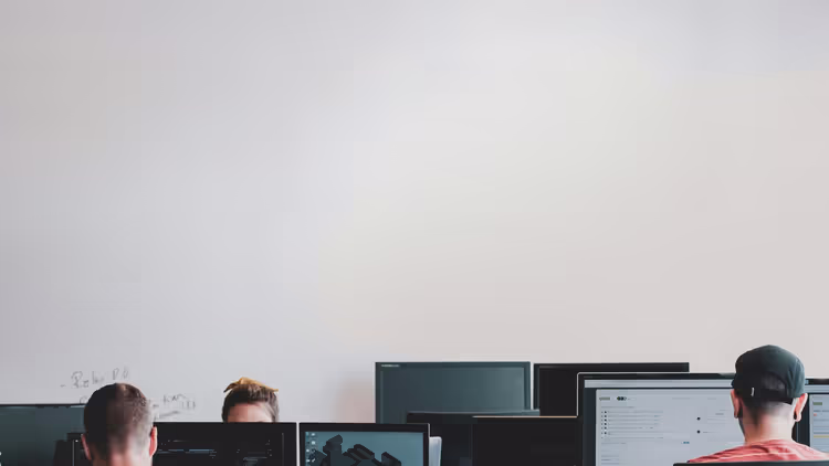 An image of some software engineers working in an office